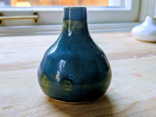 Load image into Gallery viewer, Small blue bud vase with dark green accents.
