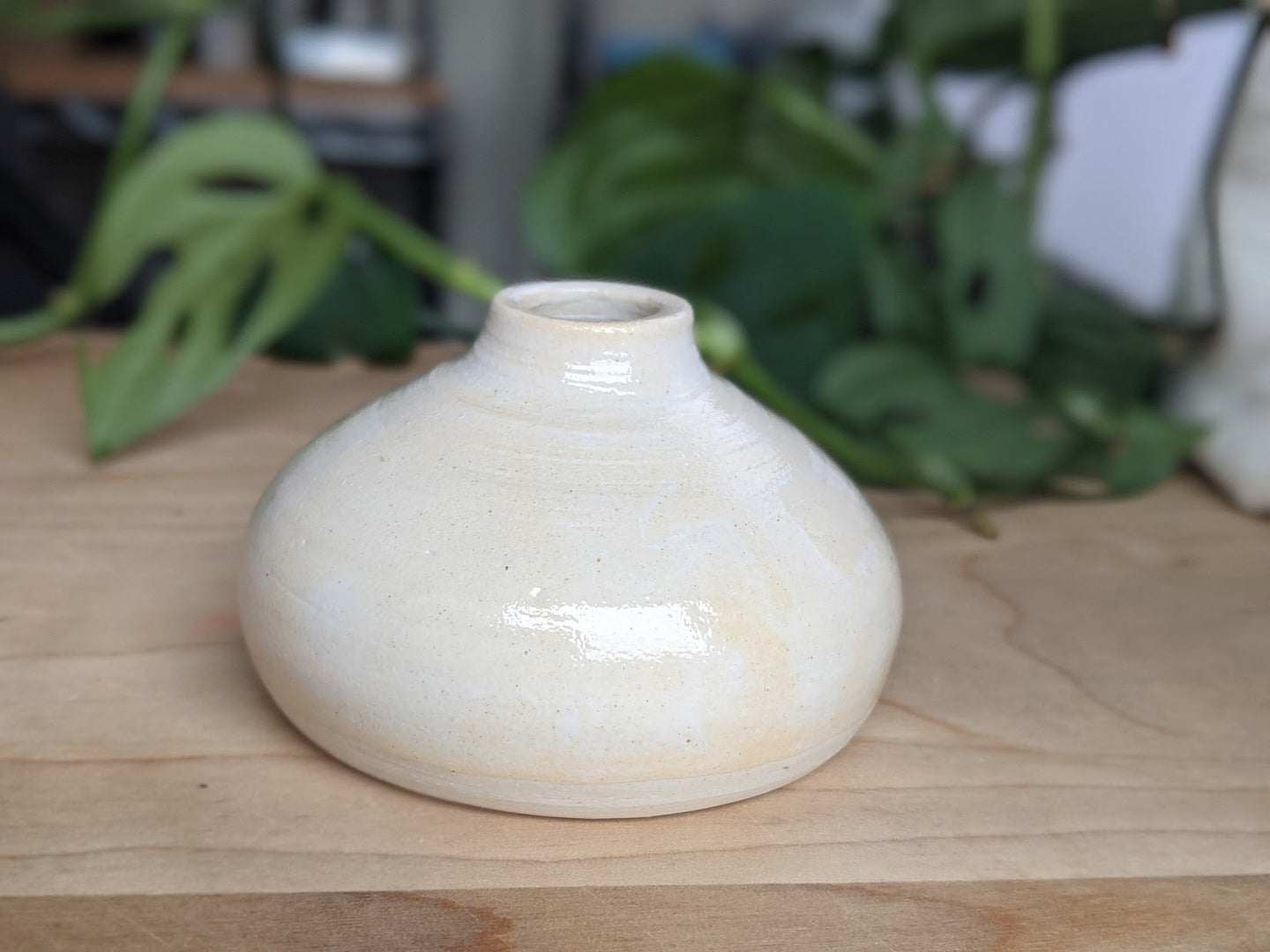 Small white bud vase